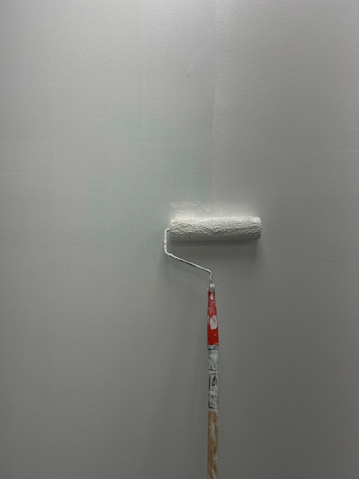 Close-up of a freshly repainted, inventory-ready flat interior